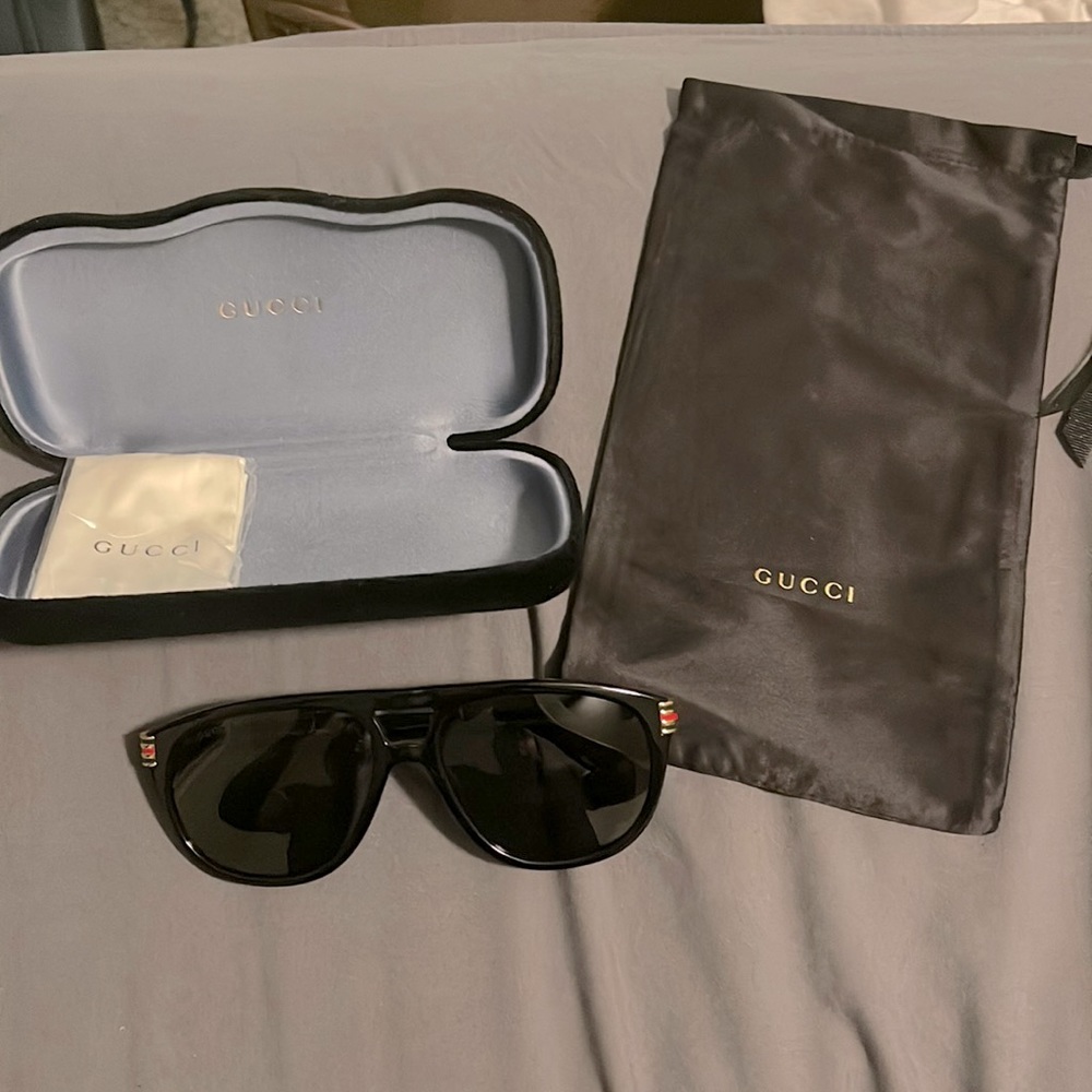 Brand new, never worn, Gucci sunglasses for men.